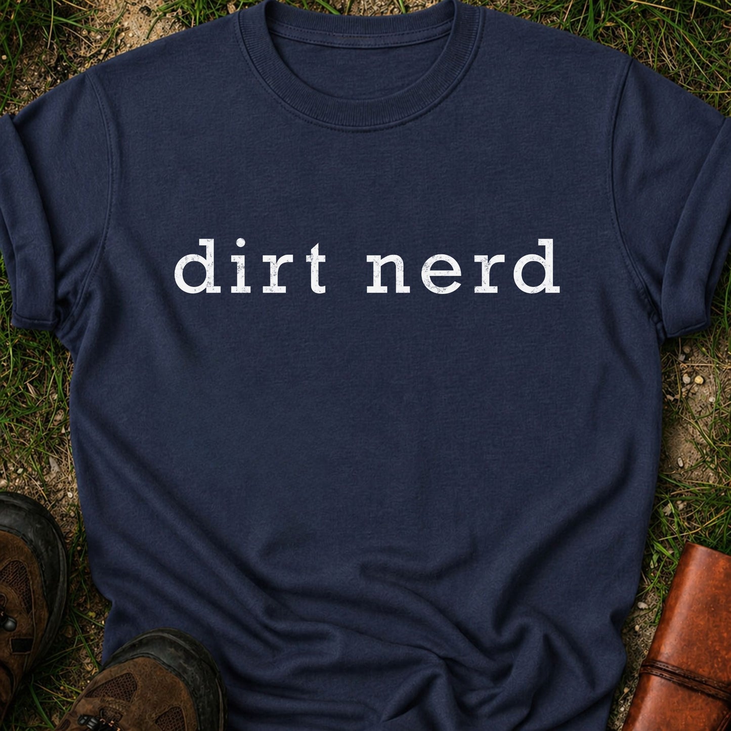 Navy blue t-shirt with 'dirt nerd' text on grass