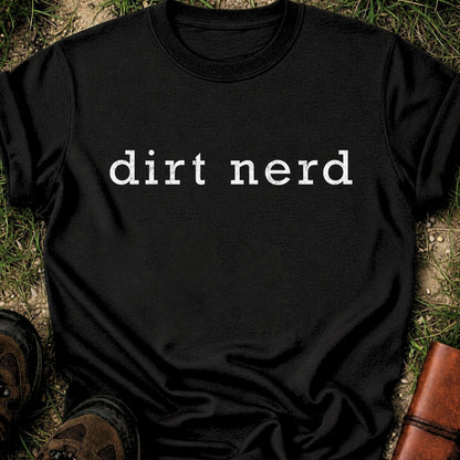 Black t-shirt with 'dirt nerd' text on grass