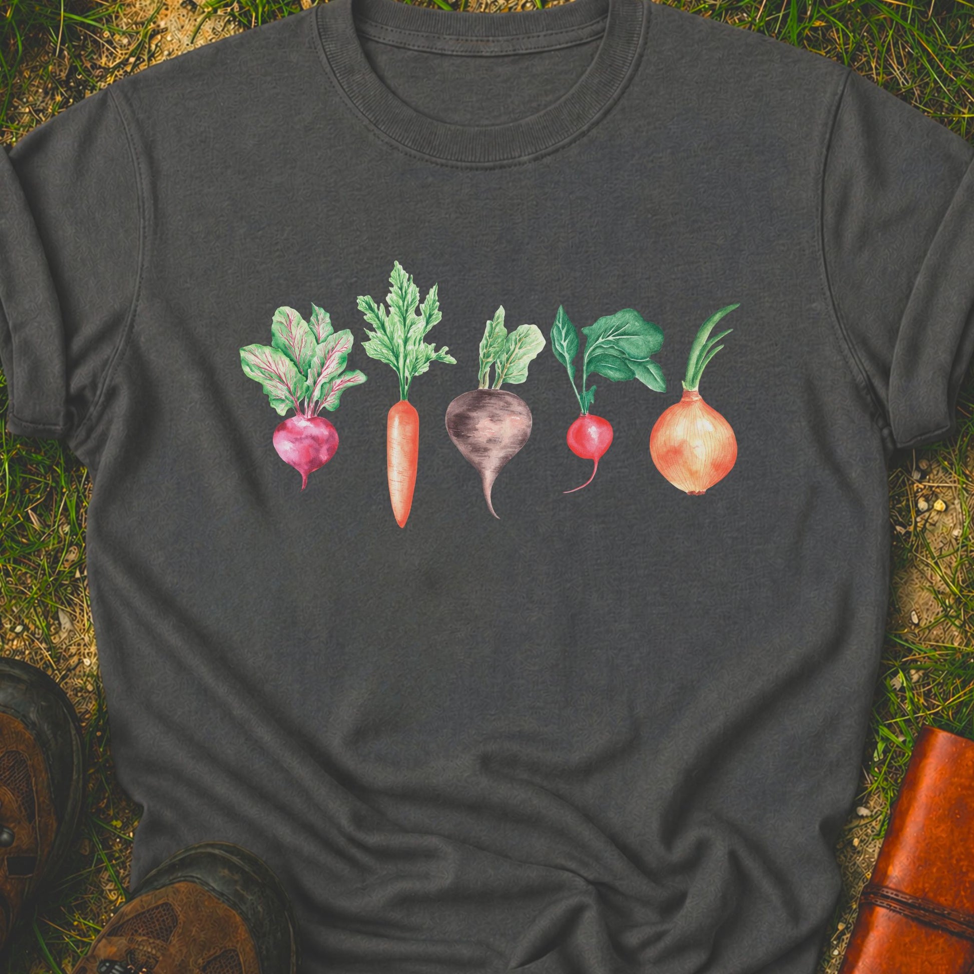 Pepper T-shirt with vegetable graphic laying flat  on a grassy surface