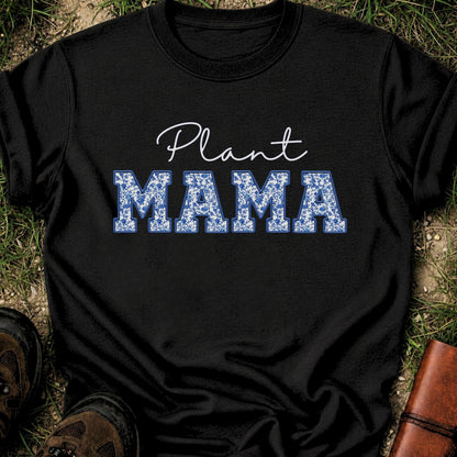 Black t-shirt with 'Plant MAMA' text on a grass surface