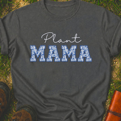 Dark gray t-shirt with 'Plant MAMA' text on a grass surface