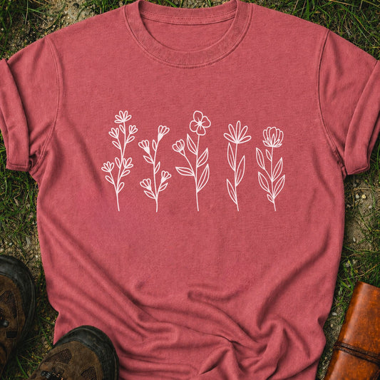 Dark Pink t-shirt with white floral designs on grass