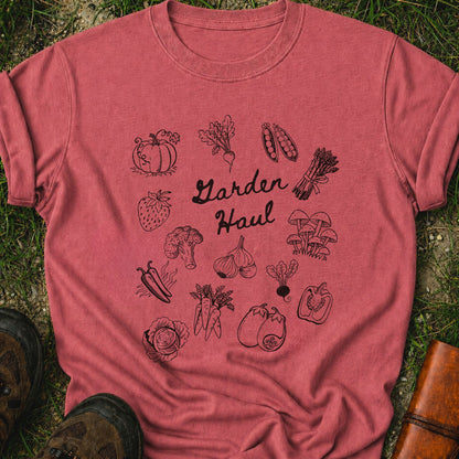Dark Pink  t-shirt with black vegetable illustrations and 'Garden Haul' text on grass